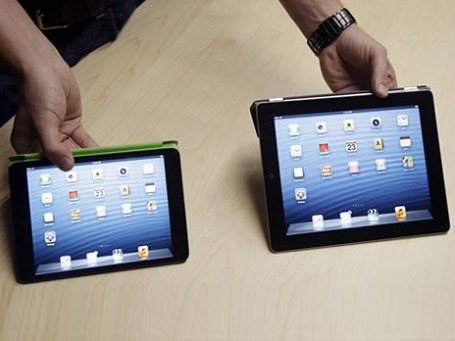 Внешне iPad Mini напоминает уменьшенную копию полноразмерного собрата. Фото: АР